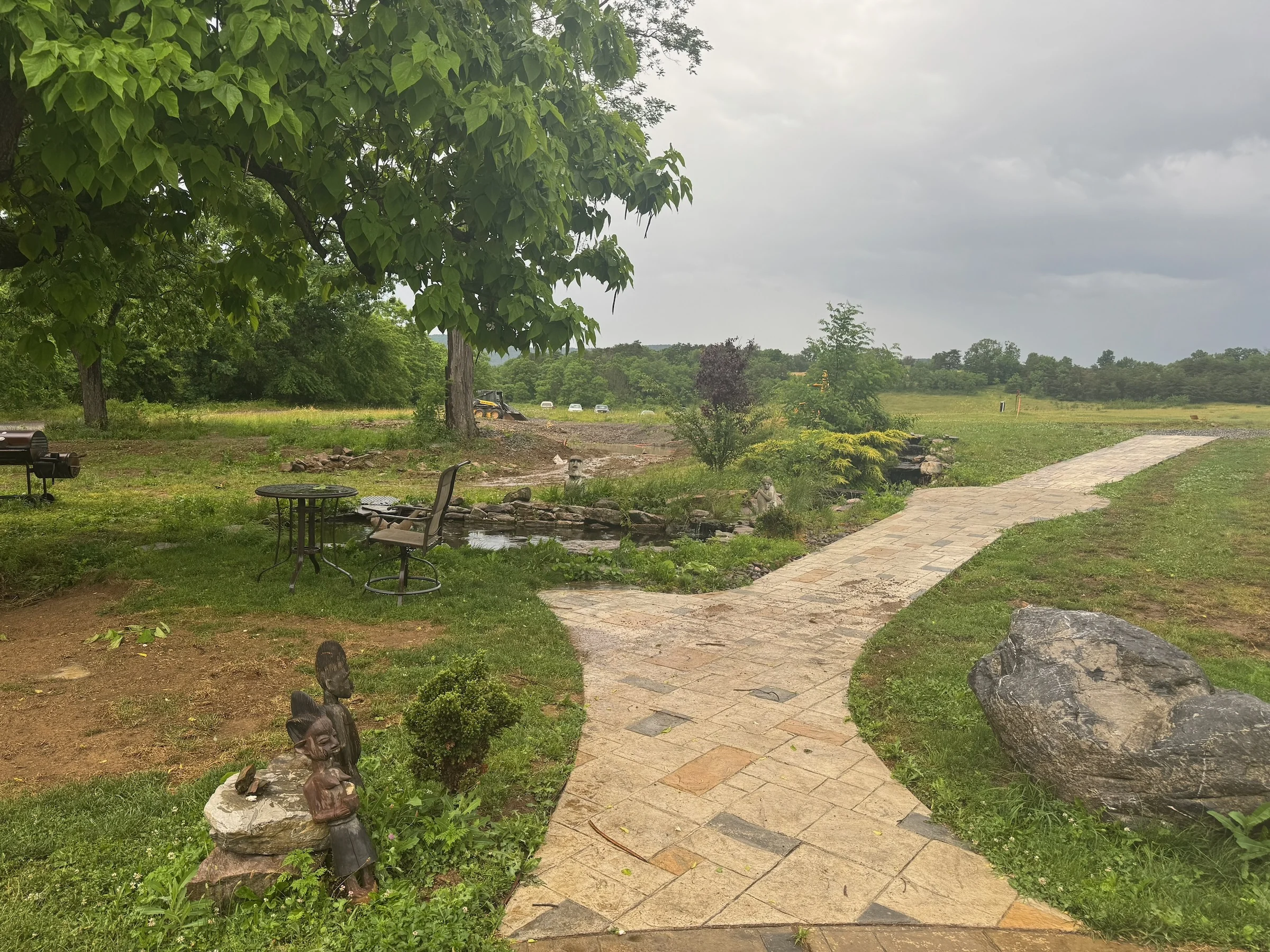 Garden paths leading toward the field